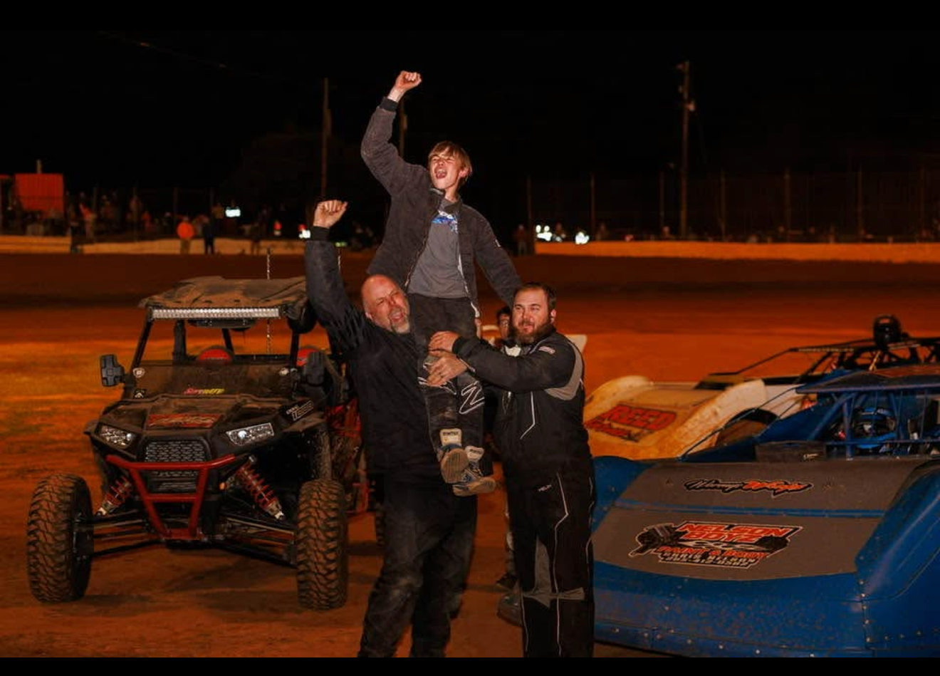 Faucett family celebrating a race win